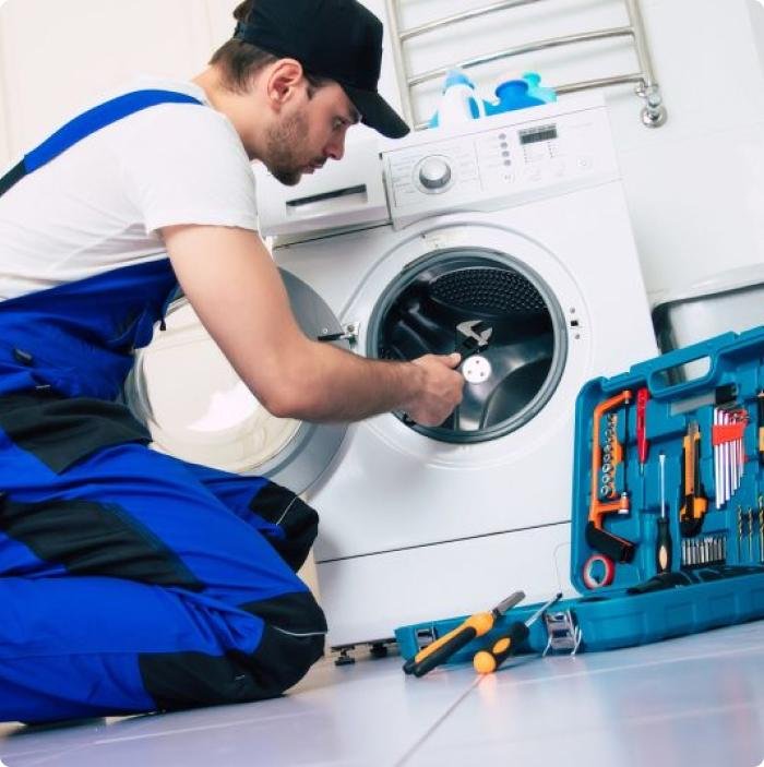 Professional washing machine repair technician